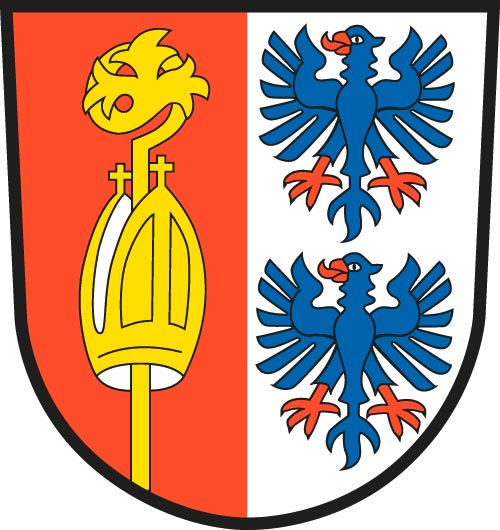 Das Wappen der Gemeinde Limbach in zwei Hälften geteilt. Links Rot mit Bischofsstab und Mütze, rechts mit zwei blauen Adlern